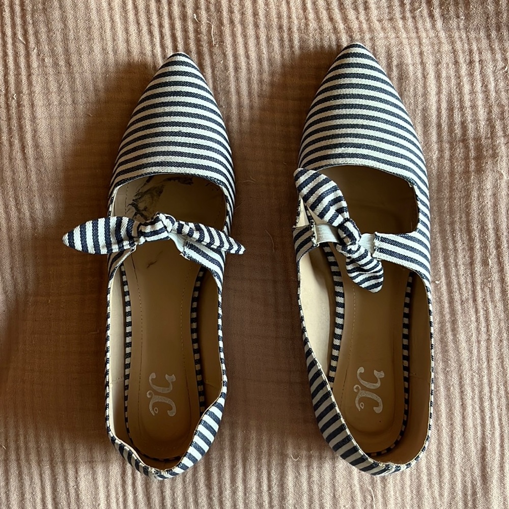 Journee Collection ballet flat with elastic bow detail. Navy and white stripe